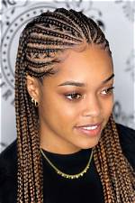 Discover the Allure of Tribal Braids with Curls: a Journey into Beauty