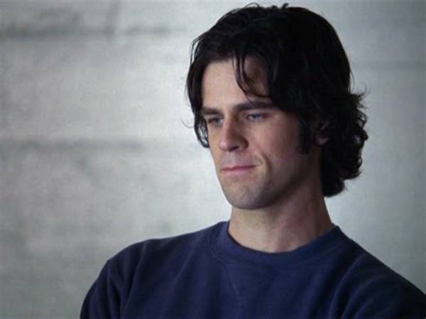 Discover the Unseen World of Eddie Cahill's Family