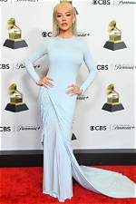 Unveiling the Dynamic Partnership of Christina Aguilera: Love, Music, and Family